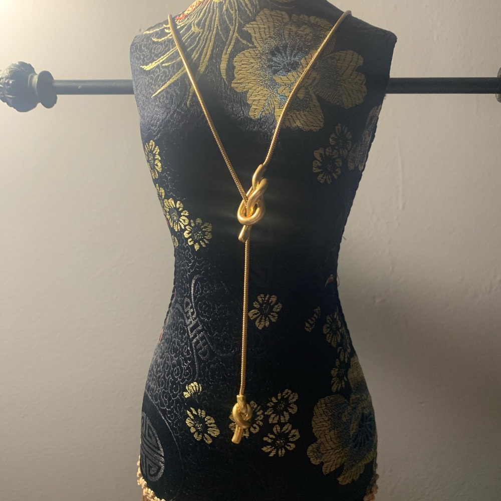 Gold tone adjustable knot necklace. From Madewell